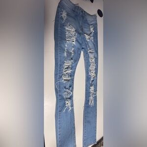 Fashion Nova Light Blue Distressed Skinny Jeans